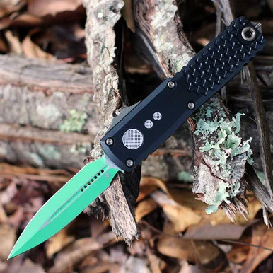 Microtech UTX-85 Gen IV Jedi Master - 3.11" Bohler M390MK Jedi Master Green Double Edge OTF Auto, Smooth Black Aluminum Chassis, Bronze Hardware - 12324-1JM